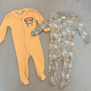 2 baby onsies. Simba characters. Never worn